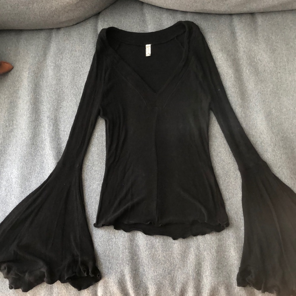 Free people black flare long sleeve top.